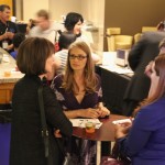 Erin speaking with guests from SafeHouse Denver